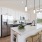 Kitchen with chef's island and stainless steel appliances