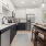 Experience thoughtfully designed spaces at The Ballast on Salem, featuring sleek quartz countertops and modern tile backsplashes.